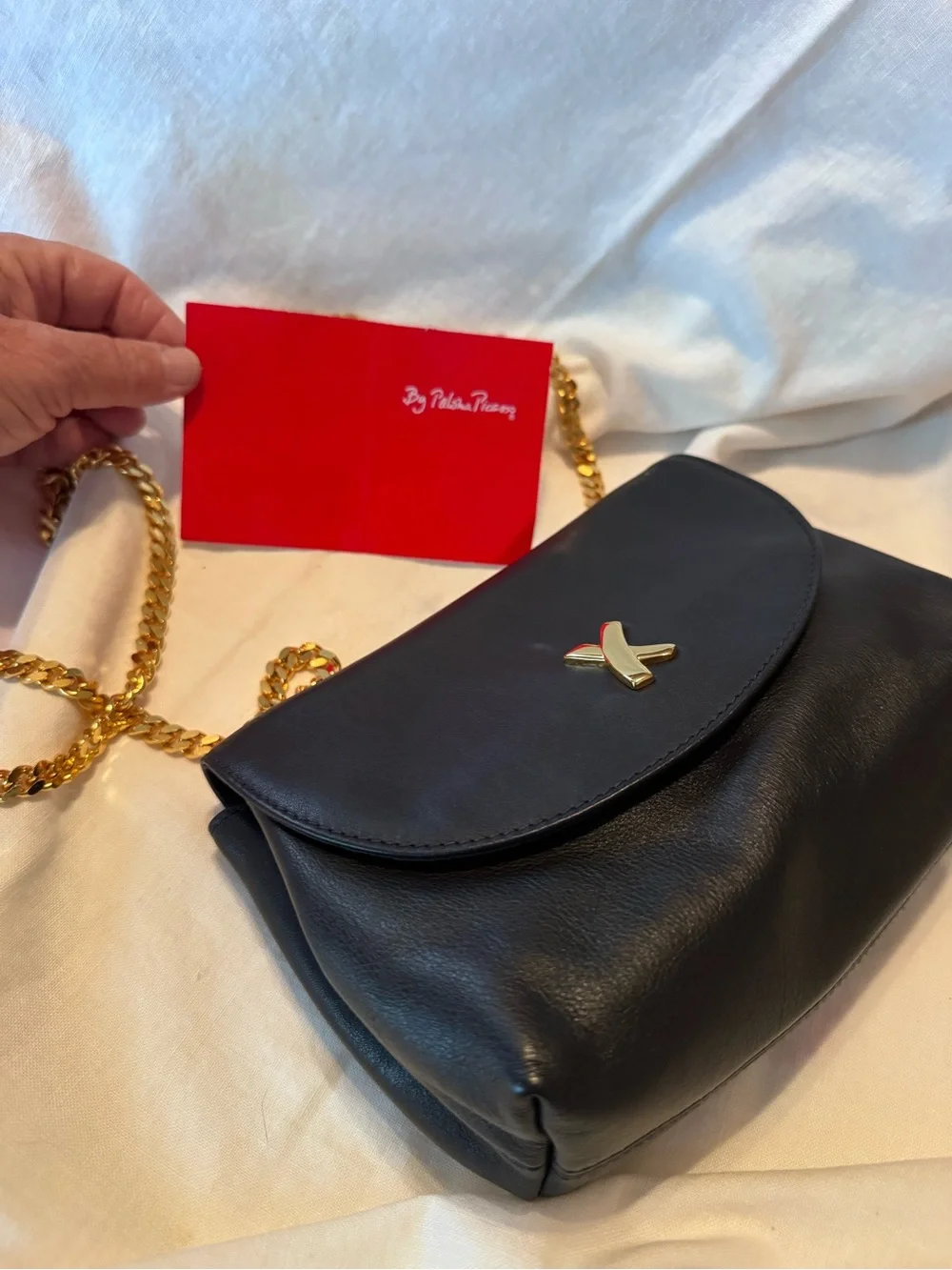 Paloma Picasso Black Leather Crossbody with Gold Chain